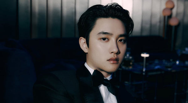 EXO's D.O. allegedly spotted smoking an e-cigarette in a music program waiting area